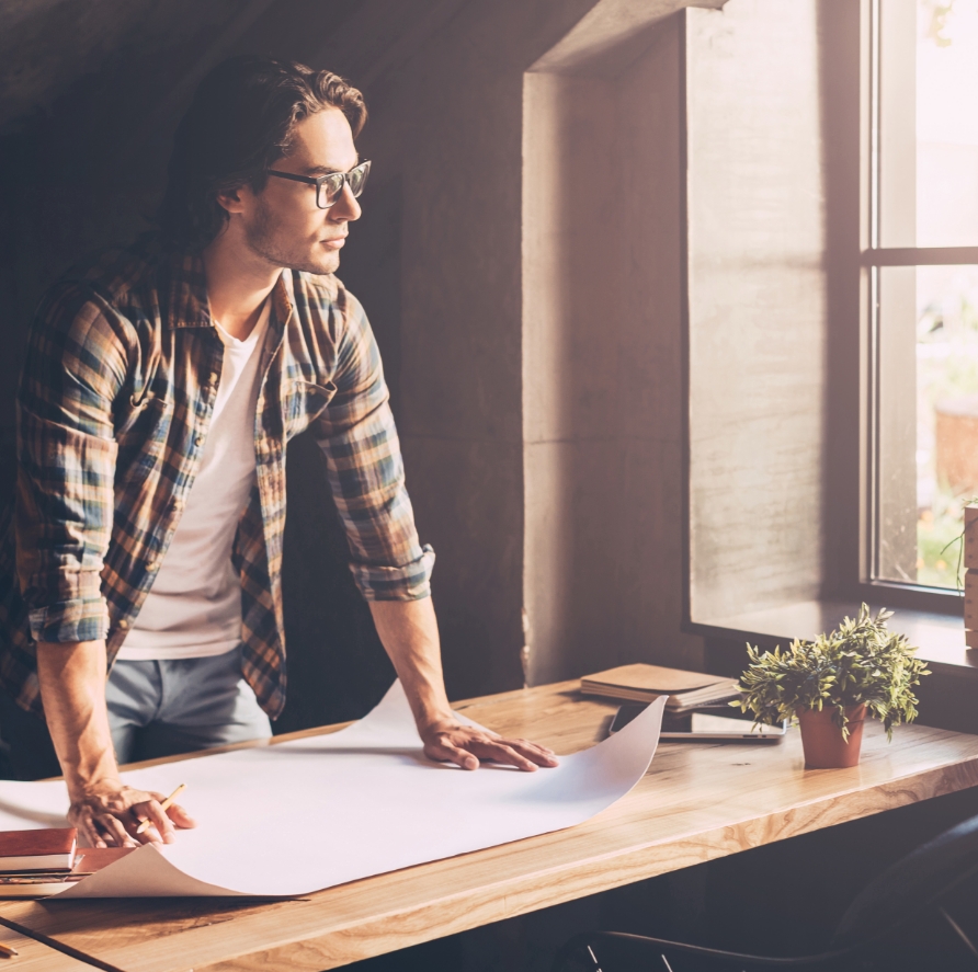 https://visconte.pl/wp-content/uploads/2023/04/waiting-inspiration-thoughtful-young-man-casual-wear-holding-pencil-leaning-wooden-desk-with-blueprint-laying-it.jpg